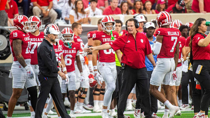 Indiana Head Coach Curt Cignetti discusses a play with E.J.. Williams (7) during the Indiana versus Michigan State football game at Memorial Stadium on Saturday, Oct. 18, 2025.