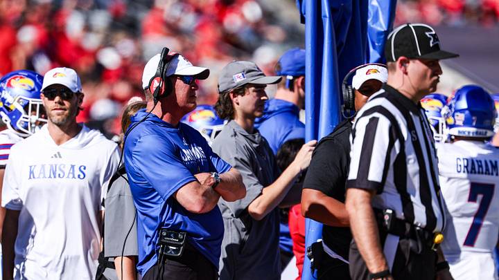 Nov 8, 2025; Tucson, Arizona, USA; Kansas Jayhawks head coach Lance Leipold watches the game from the sidelines during the first quarter against the Arizona Wildcats at Arizona Stadium. Mandatory Credit: Aryanna Frank-Imagn Images Nov 8, 2025; Tucson, Arizona, USA; Kansas Jayhawks head coach Lance Leipold watches the game from the sidelines during the first quarter against the Arizona Wildcats at Arizona Stadium. Mandatory Credit: Aryanna Frank-Imagn Images