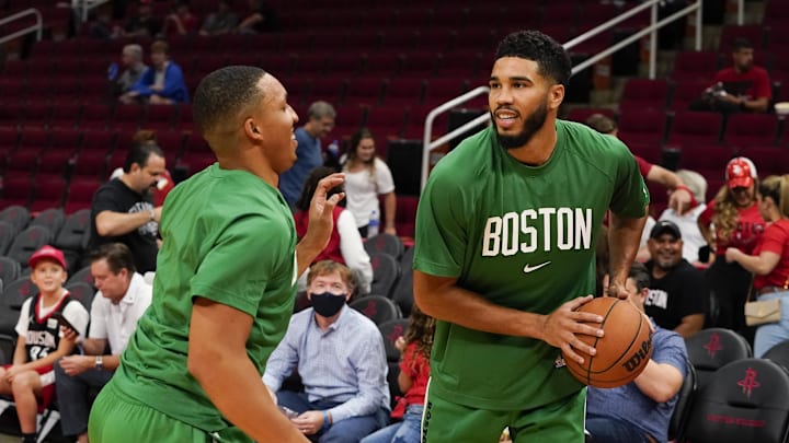 Oct 24, 2021; Houston, Texas, USA; Boston Celtics forward Grant Williams (12) covers forward Jayson