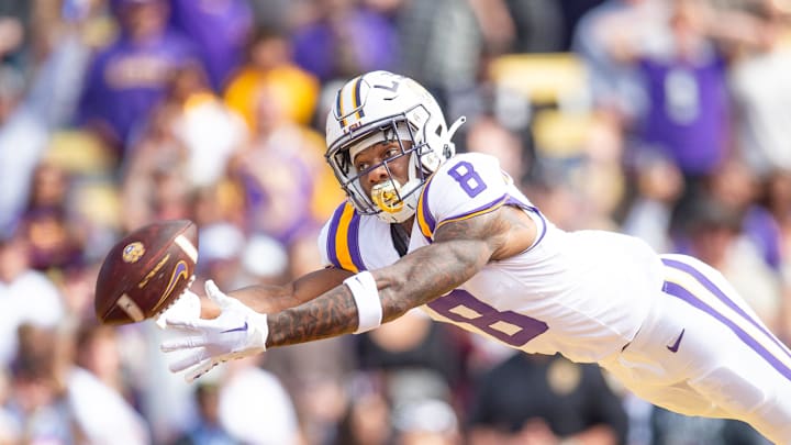 Malik Nabers 8 dives for a ball as the LSU Tigers take on Texas A&M in Tiger Stadium in Baton