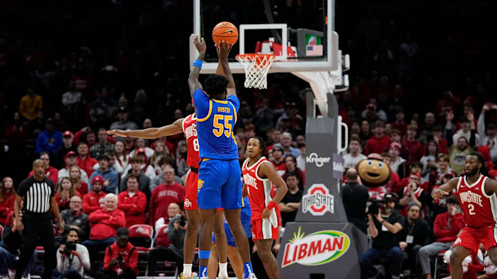 Pittsburgh Panthers forward Zack Austin (55) hits the game winning three pointer in overtime of the NCAA men's basketball game against the Ohio State Buckeyes at Value City Arena in Columbus on Friday, Nov. 29, 2024. Ohio State lost 91-90 on a last second shot.