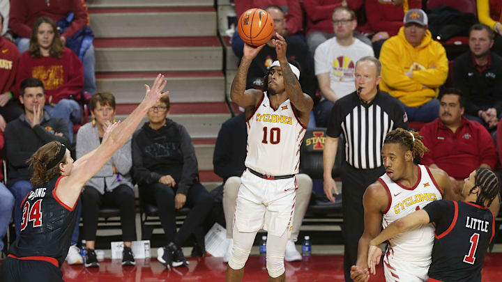 Iowa State Cyclones guard Keshon Gilbert (10) takes a three-point shot over Utah Utes center Lawson Lovering (34) during the second half in the Big-12 men’s basketball at Hilton Coliseum on Jan. 7, 2025 in Ames, Iowa.