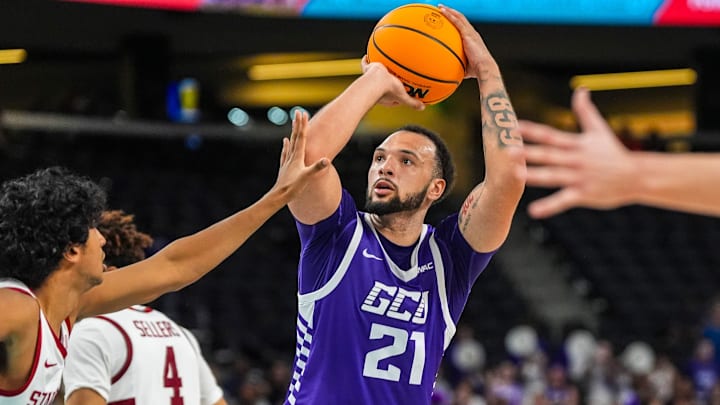 Grand Canyon forward JaKobe Coles (21) looks for a shot during the first half of their game in the Acrisure Series in Palm Desert, Calif., Tuesday, Nov. 26, 2024.