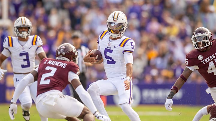 Tigers quarterback Jayden Daniels 5 runs the ball as the LSU Tigers take on Texas A&M in Tiger