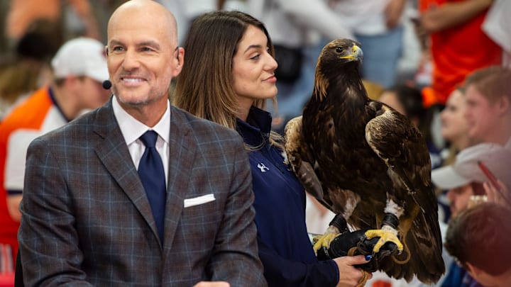 Analyst Jay Bilas and Auburn's War Eagle Aurea on the ESPN GameDay set before Auburn Tigers men's basketball takes on Texas A&M Aggies at Auburn Arena in Auburn, Ala., on Saturday, Feb. 12, 2022.