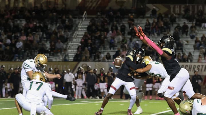 Oaks Christian's Hayden Lowe blocks the field goal attempt from St. Bonaventure's George Mann during the second quarter of Oaks Christian's 35-0 Marmonte League win over visiting St. Bonaventure Friday at Redell Field.