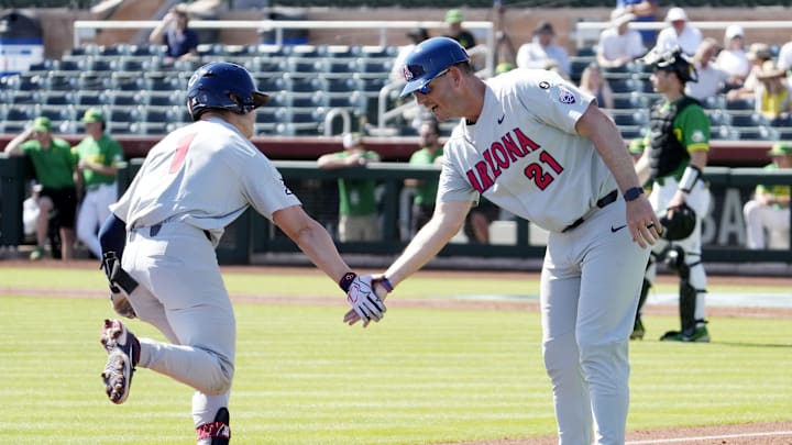 May 25, 2022; Scottsdale, Arizona, USA; Arizona Wildcats Garen Caulfield (1) heads for home after hitting a two-run home run against the Oregon Ducks in the second inning during the Pac-12 Baseball Tournament at Scottsdale Stadium.

Ncaa Baseball Arizona At Oregon