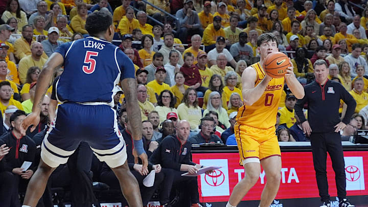 Iowa State Cyclones guard Nate Heise (0) takes a three point shot over Arizona Wildcats guard KJ Lewis (5) during the first half in the Big-12 men’s basketball showdown at Hilton Coliseum on Saturday March 1, 2025 in Ames, Iowa.
