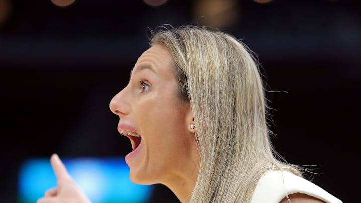Buffalo Bulls head coach Becky Burke works the sideline during the first half of the Mid-American Conference Tournament women's championship game at Rocket Mortgage FieldHouse, Saturday, March 16, 2024, in Cleveland, Ohio.
