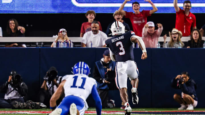 Oct 11, 2025; Tucson, Arizona, USA; Arizona Wildcats running back Kedrick Reescano (3) runs a touchdown in the fourth quarter of the game against the Brigham Young Cougars at Arizona Stadium. Mandatory Credit: Aryanna Frank-Imagn Images