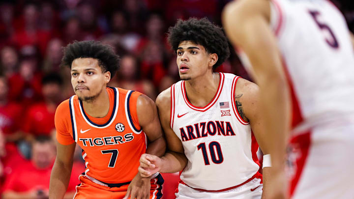 Dec 6, 2025; Tucson, Arizona, USA; Auburn Tigers forward Keyshawn Hall (7) and Arizona Wildcats forward Koa Peat (10) prepare for the tip off before the start of the game at McKale Memorial Center. Mandatory Credit: Aryanna Frank-Imagn Images Dec 6, 2025; Tucson, Arizona, USA; Auburn Tigers forward Keyshawn Hall (7) and Arizona Wildcats forward Koa Peat (10) prepare for the tip off before the start of the game at McKale Memorial Center. Mandatory Credit: Aryanna Frank-Imagn Images