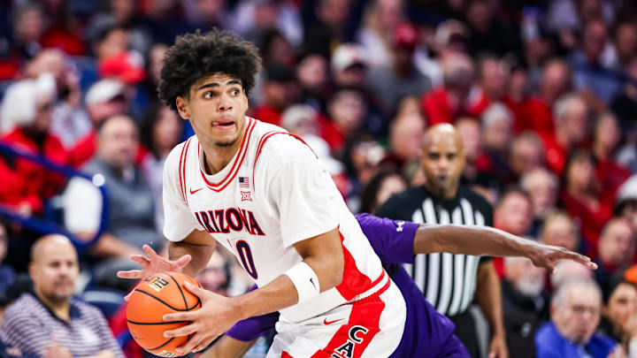 Dec 16, 2025; Tucson, Arizona, USA; Arizona Wildcats forward Koa Peat (10) looks to pass the ball during the first half of the game against the Abilene Christian Wildcats at McKale Memorial Center. Mandatory Credit: Aryanna Frank-Imagn Images