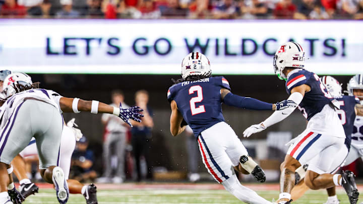 Sep 12, 2025; Tucson, Arizona, USA; Arizona Wildcats wide receiver Jeremiah Patterson (2) runs the ball during the third quarter of the game against the Kansas State Wildcats at Arizona Stadium. Mandatory Credit: Aryanna Frank-Imagn Images