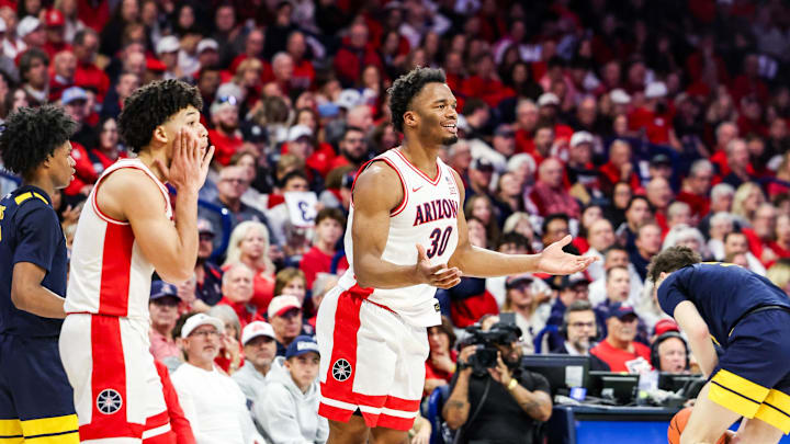 Jan 24, 2026; Tucson, Arizona, USA; Arizona Wildcats forward Tobe Awaka (30) reacts to a foul during the first half of the game against the West Virginia Mountaineers at McKale Memorial Center. Mandatory Credit: Aryanna Frank-Imagn Images