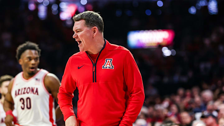 Feb 7, 2026; Tucson, Arizona, USA; Arizona Wildcats head coach Tommy Lloyd yells out to players during the first half of the game against the Oklahoma State Cowboys at McKale Memorial Center. Mandatory Credit: Aryanna Frank-Imagn Images