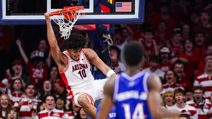 Feb 28, 2026; Tucson, Arizona, USA; Arizona Wildcats forward Koa Peat (10) dunks the ball during the first half of the game against the Kansas Jayhawks at McKale Memorial Center. Mandatory Credit: Aryanna Frank-Imagn Images