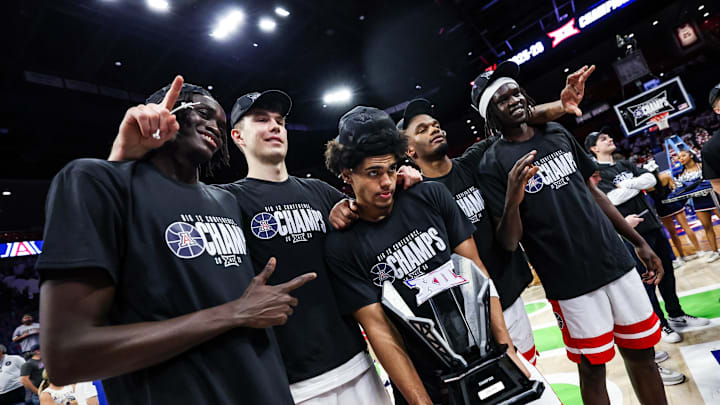 Mar 2, 2026; Tucson, Arizona, USA; The Arizona Wildcats celebrates after they defeat the Iowa State Cyclones   at McKale Memorial Center. Mandatory Credit: Aryanna Frank-Imagn Images