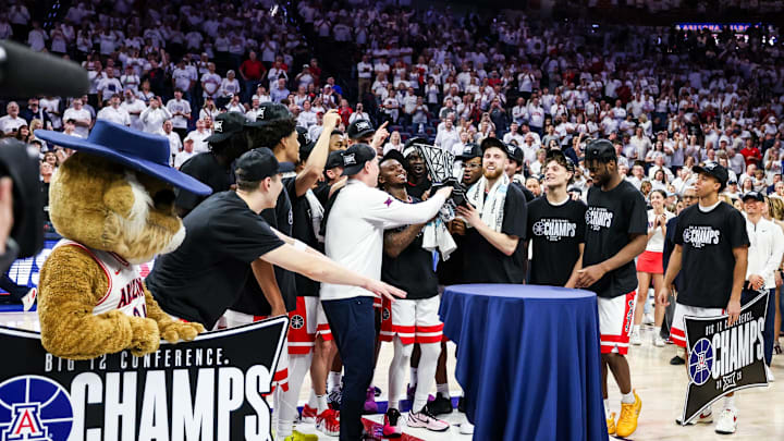 Mar 2, 2026; Tucson, Arizona, USA; The Arizona Wildcats celebrate after they defeat the Iowa State Cyclones at McKale Memorial Center. Mandatory Credit: Aryanna Frank-Imagn Images