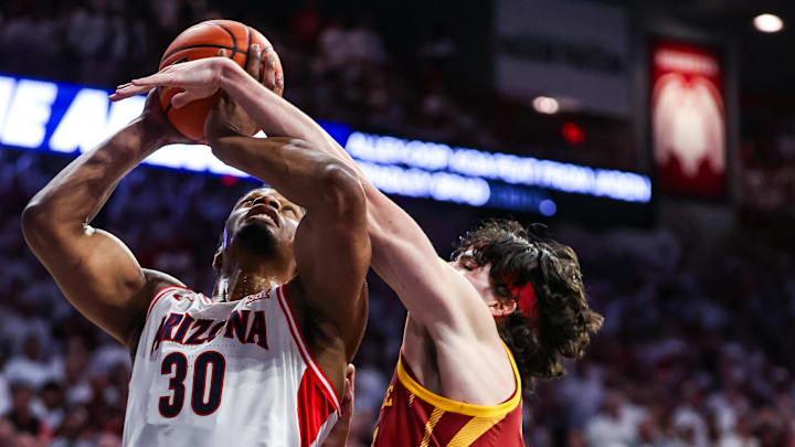 Mar 2, 2026; Tucson, Arizona, USA; Iowa State Cyclones forward Milan Momcilovic (22) fouls Arizona Wildcats forward Tobe Awaka (30) during the second half of the game at McKale Memorial Center. Mandatory Credit: Aryanna Frank-Imagn Images