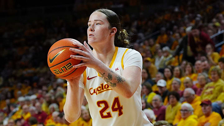 Iowa State Cyclones' forward Addy Brown (24) takes a three-point shot against Oklahoma State Cowgirls during the first quarter in the senior day women basketball at Hilton Coliseum on February. 25, 2026, in Ames, Iowa.