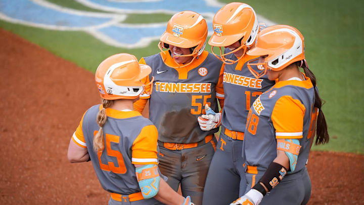 Teammates celebrate with Tennessee's Ella Dodge (25) after Dodge hit a two-run home run during a college softball game between Tennessee and Kennesaw State at Sherri Parker Lee Stadium in Knoxville on April 8, 2026.
