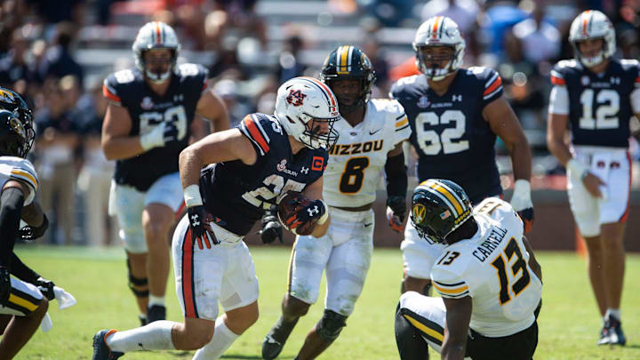 Auburn Tigers tight end John Samuel Shenker (25) turns up field after catching the ball as Auburn Tigers take on Missouri Tigers at Jordan-Hare Stadium in Auburn, Ala., on Saturday, Sept. 24, 2022. Auburn Tigers defeated Missouri Tigers 17-14.