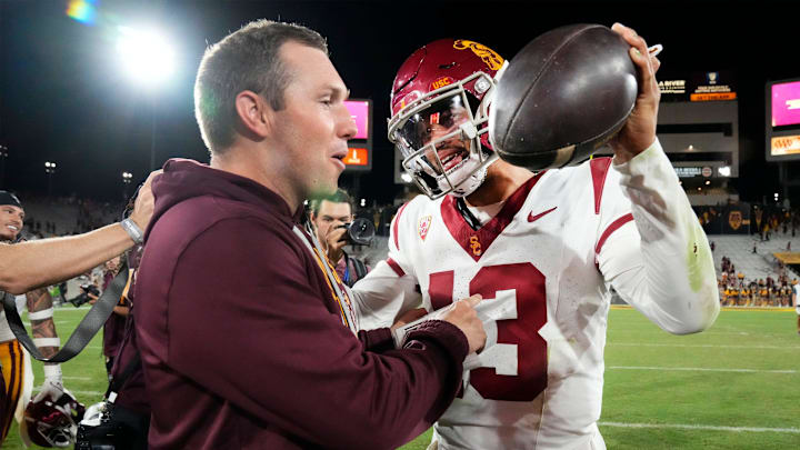 Arizona State Sun Devils head coach Kenny Dillingham congratulates USC Trojans quarterback Caleb