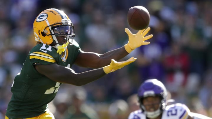 Sep 29, 2024; Green Bay, Wisconsin, USA;  Green Bay Packers wide receiver Jayden Reed (11) pulls in a fourth quarter pass against the Minnesota Vikings during their football game on Sunday, September 29, 2024 at Lambeau Field in Green Bay, Wis. The Vikings defeated the Packers 31-29. Mandatory Credit: William Glasheen/USA TODAY Network via Imagn Images