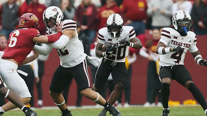 Texas Tech Red Raiders' running back Cam'Ron Valdez (20) runs with the ball against Iowa State during the first quarter in the NCAA football at Jack Trice Stadium on Saturday, Nov. 2, 2024, in Ames, Iowa.