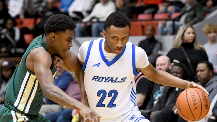CVCA's Darryn Peterson drives to the basket past St. Vincent-St. Mary's Torell Hopson in the first half at Canton Memorial Civic Center, Saturday, Feb. 18, 2023.

Svsm Cvca Boys Bball 81