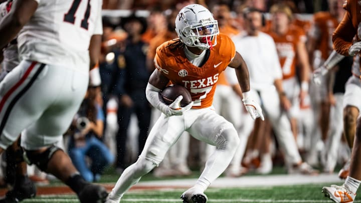 Texas Longhorns wide receiver Isaiah Bond (7) carries the ball down the field after making an interception for Texas in the third quarter of the Longhorns' game against the Georgia Bulldogs at Darrell K. Royal-Texas Memorial Stadium in Austin, Oct. 19, 2024.