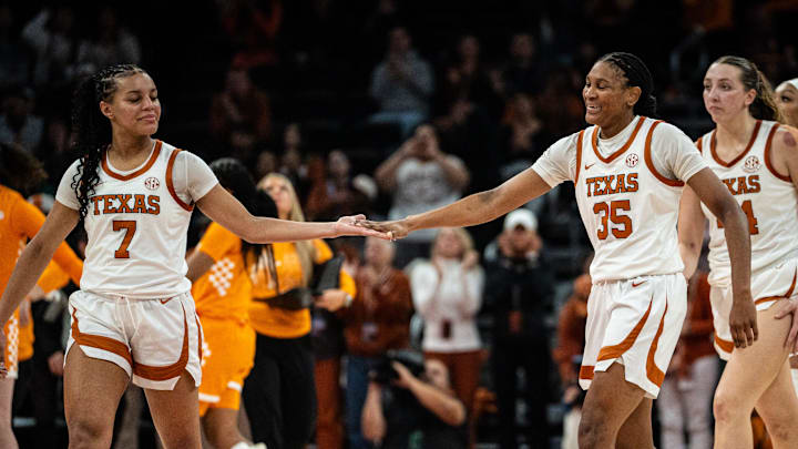 Texas Longhorns forward Madison Booker (35) and guard Jordan Lee (7) celebrate a play late in the second half as the Texas Longhorns take on the Tennessee Lady Vols in the Moody Center, Jan. 23, 2025.