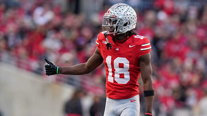 Nov 18, 2023; Columbus, Ohio, USA; Ohio State Buckeyes wide receiver Marvin Harrison Jr. (18) checks