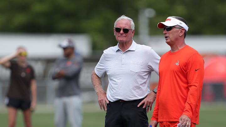 Browns owner Jimmy Haslam, left, watches practice with defensive coordinator Jim Schwartz during minicamp, Thursday, June 13, 2024, in Berea.