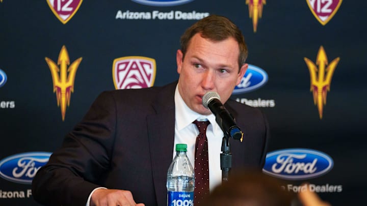 Kenny Dillingham is emotional as he speaks at a news conference, introducing him as ASU's new head football coach on Nov. 27, 2022, at Sun Devil Stadium in Tempe, AZ.