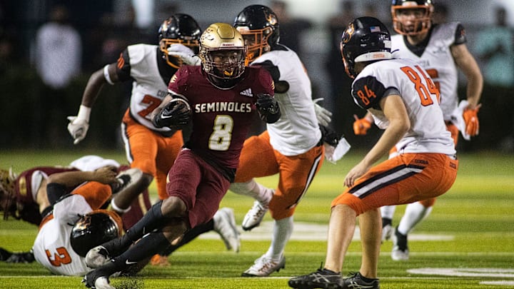 Florida High running back Micahi Danzy (8) dodges the Cocoa defense as the Seminoles face the Tigers in the 2022 2S state championship at Gene Cox Stadium on Friday, Dec. 9, 2022 in Tallahassee, Fla.

Footballers 36