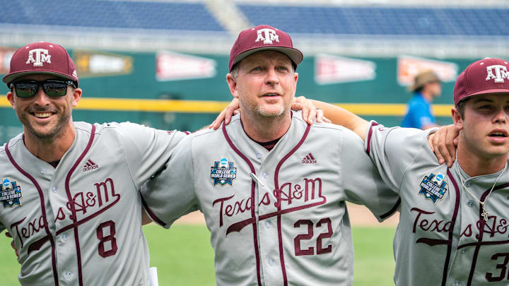 Jun 21, 2022; Omaha, NE, USA; Texas A&M head coach Jim Schlossnagle (22) celebrates the win over