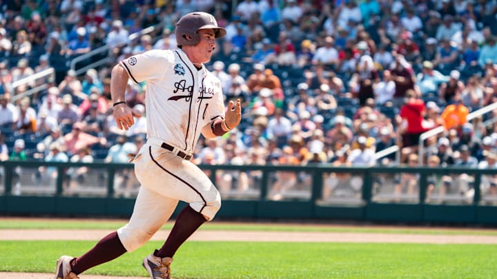 Jun 19, 2022; Omaha, NE, USA; Texas A&M Aggies second baseman Ryan Targac (16) runs to third