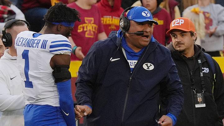 BYU Cougars football head coach Kalani Sitake celebrates after a defensive stop against Iowa State during the fourth quarter at Jack Trice Stadium on Oct. 25, 2025, in Ames, Iowa.