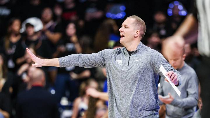 Feb 18, 2026; Tucson, Arizona, USA; Brigham Young Cougars head coach Kevin Young yells out to players during the first half of the game against the Arizona Wildcats at McKale Memorial Center. Mandatory Credit: Aryanna Frank-Imagn Images