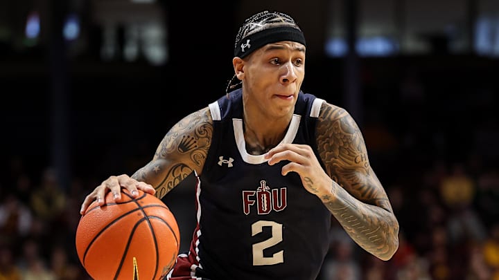 Dec 21, 2024; Minneapolis, Minnesota, USA; Fairleigh Dickinson Knights guard Terrence Brown (2) dribbles during the second half against the Minnesota Golden Gophers at Williams Arena. Mandatory Credit: Matt Krohn-Imagn Images