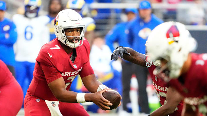Arizona Cardinals quarterback Jacoby Brissett (7) hands off the ball against the Los Angeles Rams in the first half at State Farm Stadium on Dec 7, 2025, in Glendale, Ariz. Arizona Cardinals quarterback Jacoby Brissett (7) hands off the ball against the Los Angeles Rams in the first half at State Farm Stadium on Dec 7, 2025, in Glendale, Ariz.