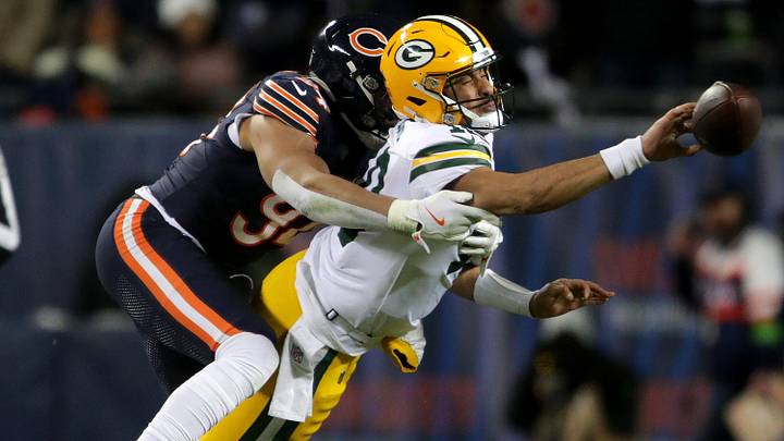 Green Bay Packers quarterback Jordan Love (10) is pressured by Chicago Bears defensive end Austin Booker (94) during their wild-card playoff football game Saturday, January 10, 2026, at Soldier Field in Chicago, Illinois. Green Bay Packers quarterback Jordan Love (10) is pressured by Chicago Bears defensive end Austin Booker (94) during their wild-card playoff football game Saturday, January 10, 2026, at Soldier Field in Chicago, Illinois.