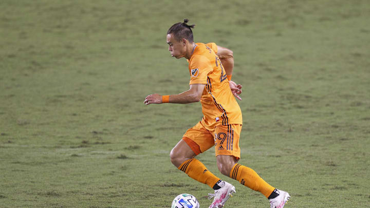 Oct 14, 2020; Houston, Texas, USA; Houston Dynamo defender Sam Junqua (29) dribbles against the