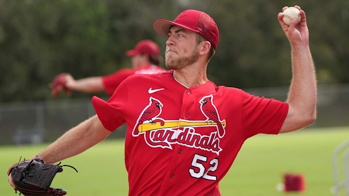 Feb 17, 2023; Jupiter, FL, USA; St. Louis Cardinals starting pitcher Matthew Liberatore (52) warms