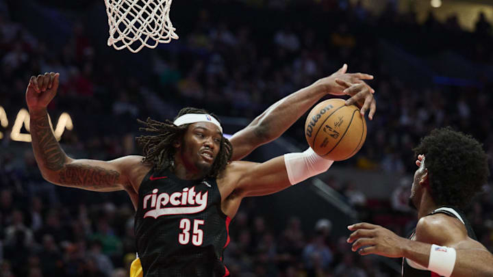 Feb 20, 2025; Portland, Oregon, USA; Portland Trail Blazers center Robert Williams III (35) grabs a rebound during the second half against the Los Angeles Lakers at Moda Center. Mandatory Credit: Troy Wayrynen-Imagn Images