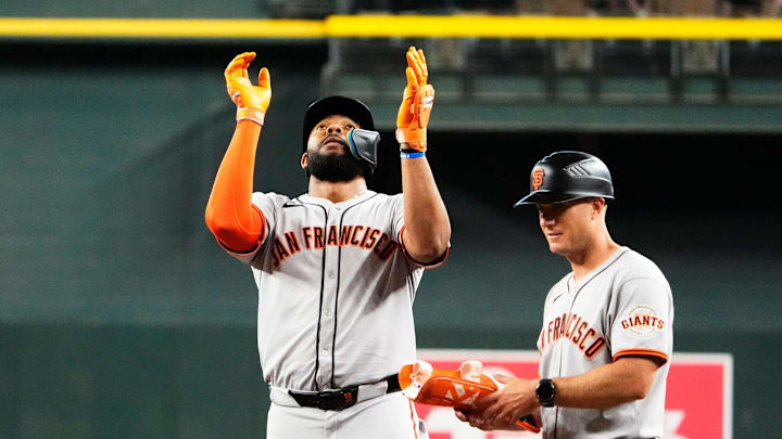 San Francisco Giants Jerar Encarnacion (59) reacts after hitting an RBI-signal against the Arizona Diamondbacks in the 11th inning at Chase Field on Sept. 17, 2025.