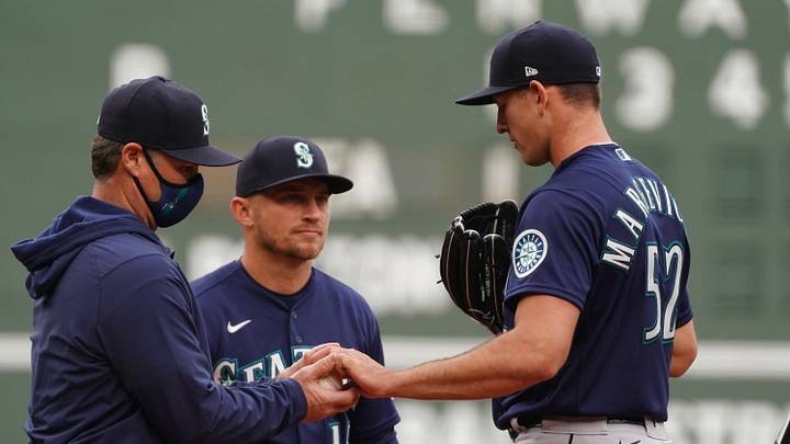 Apr 25, 2021; Boston, Massachusetts, USA; Seattle Mariners manager Scott Servais (9) relives starting pitcher Nick Margevicius (52) as they take on the Boston Red Sox in the first inning at Fenway Park. Mandatory Credit: David Butler II-Imagn Images Apr 25, 2021; Boston, Massachusetts, USA; Seattle Mariners manager Scott Servais (9) relives starting pitcher Nick Margevicius (52) as they take on the Boston Red Sox in the first inning at Fenway Park. Mandatory Credit: David Butler II-Imagn Images