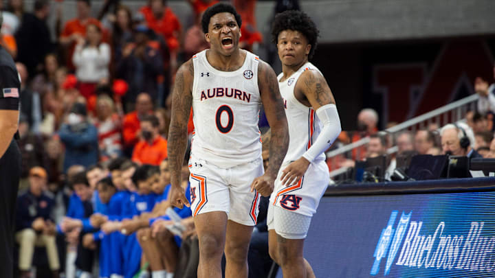 Auburn Tigers guard K.D. Johnson (0) celebrates as Auburn Tigers men's basketball takes on Kentucky