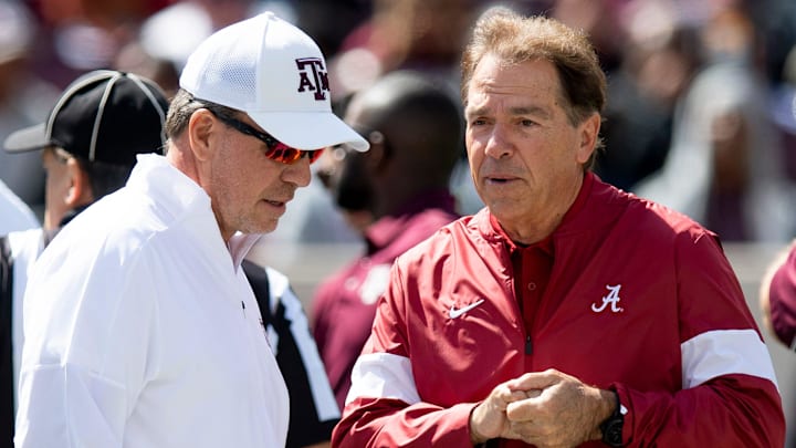 Texas A&M head coach Jimbo Fisher and Alabama head coach Nick Saban meet pregame before their game. A&M defeated Alabama 41-38 in 2021.